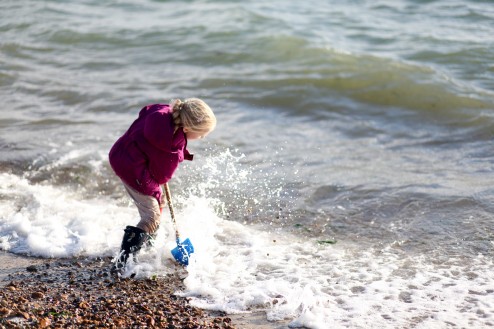 Pushing the waves back and getting wet