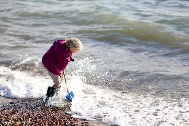 Pushing the waves back and getting wet